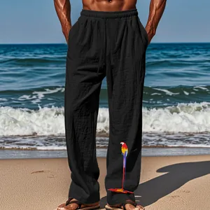 Pantalon décontracté en coton et lin noir pour homme avec imprimé perroquet coloré sur la jambe