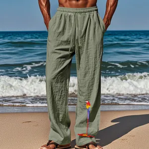 Détail du pantalon large en coton et lin pour homme avec imprimé perroquet