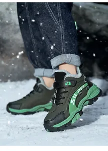 Warm children's winter outdoor hiking boots with faux fur lining shown on snow