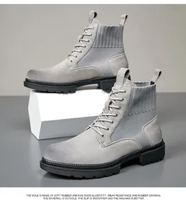 Zijaanzicht grijze heren Martin boots met dikke zool en elastische gebreide zijpanelen
