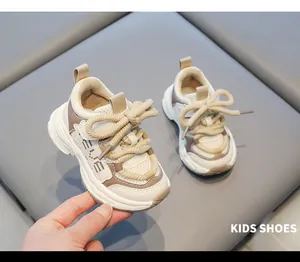 Detailed view of breathable toddler chunky sneakers with soft non-slip soles.