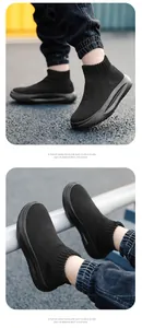 Vue détaillée des chaussures montantes en maille respirante noire pour enfants