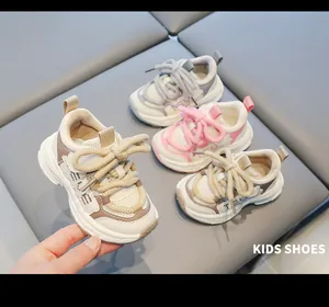 Detailed view of breathable mesh toddler sneakers with soft shock-absorbing soles