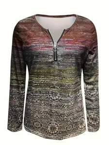 Détail du haut pour femme avec fermeture éclair, motif vintage dégradé et zip métallique.