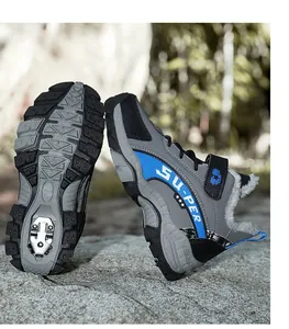 Detail view showing warm lining and rugged non-slip sole of children's winter hiking shoes