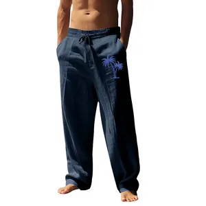 Men's breathable cotton linen loose pants featuring a stylish blue palm tree print detail