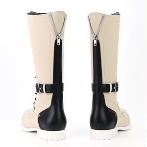 Rear view of vintage men's motorcycle boots with back zippers and buckle details.