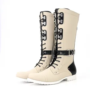 Side view of cream and black vintage men's knight boots with buckle and lace-up details