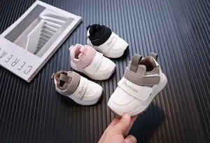 Close-up showing various colors of waterproof leather baby sneakers for toddlers