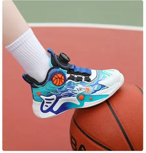Close-up of children's basketball shoe with rotary dial lacing on a basketball