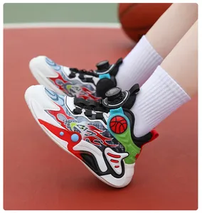 Close-up of boys' professional basketball shoes with unique rotary buckle system.