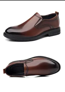 Vista dettagliata di scarpe eleganti in pelle marrone con punta sfumata e decori