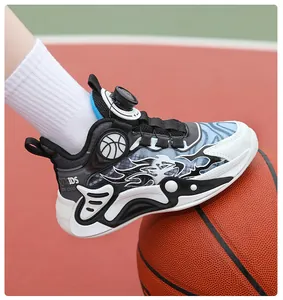 Detailed view of professional boys basketball shoes with dial lacing system on a court