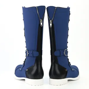 Rear view of men's blue and black vintage biker boots with silver zippers and buckles