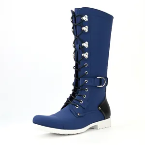 Side view detail of tall blue motorcycle boots with black laces and white sole