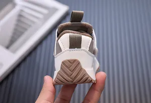 Close-up detail of the anti-slip rubber sole and heel design on toddler walking shoes.