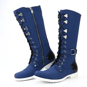 Side view of retro blue men's motorcycle boots with lace-up and side zipper details