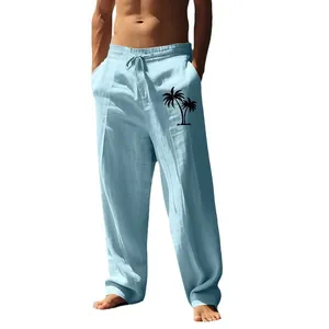 Men's loose cotton linen casual pants with coconut tree print in light blue.