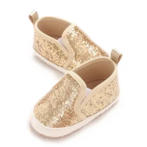 Detailed macro view showing the gold glitter texture of soft sole baby walker shoes