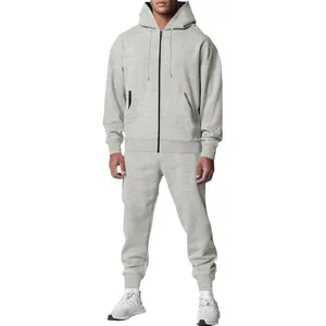 Tuta sportiva da uomo in pile grigio con felpa con cappuccio, zip e pantaloni jogger
