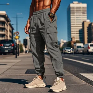Men's gray cargo joggers with drawstring waist and multiple utility pockets for urban style.