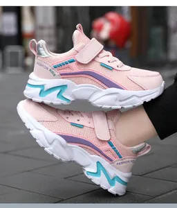 Detailed view of pink breathable mesh sneakers for girls with teal color accents.