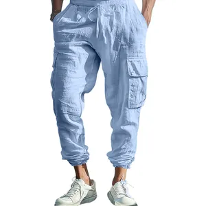 Detailed view of men's light blue cotton-linen cargo joggers with drawstring waist