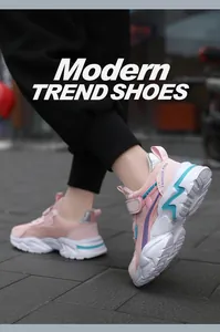 Detailed view of pink breathable mesh sneakers for girls with modern thick soles