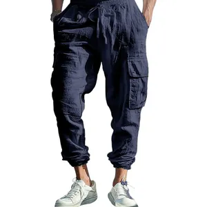 Close-up view of lightweight cotton linen cargo pants featuring large functional side pockets.