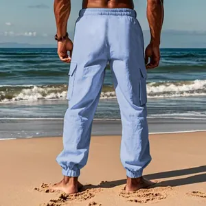 Back view of men's light blue cotton linen cargo joggers with elastic drawstring waist