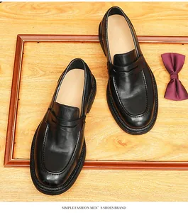 Detail view of vintage black horsehide handmade men's leather loafers in British style.
