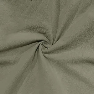 Macro detail of breathable cotton-linen fabric texture for men's casual cargo pants