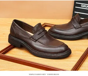 Detailed macro view of vintage brown horsehide loafers with textured Goodyear soles