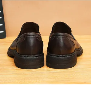 Detailed rear view showing the craftsmanship of retro brown horsehide leather loafers