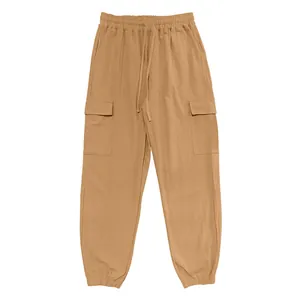 Detailed view of men's cargo pants with drawstring waist and large side pockets