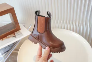 Classic brown children's Chelsea boot with a durable rubber sole for boys and girls