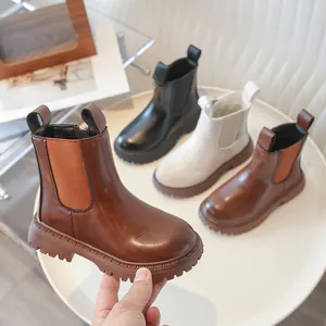 Children's British style Chelsea Martin boots in classic brown and black faux leather