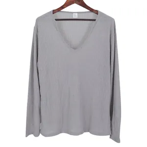 Detail view of grey long-sleeved ribbed V-neck T-shirt in thin knit fabric