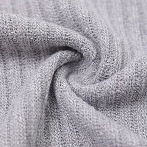 Macro view of the soft grey ribbed knitted fabric texture for men's lightweight sweaters