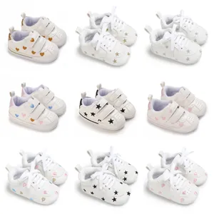 Grid view of various stylish infant walking shoes with heart and star patterns
