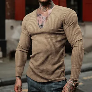 Slim fit khaki V-neck ribbed long sleeve t-shirt for men in a casual urban street style.
