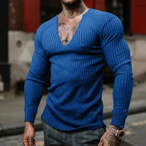 Stylish men's blue slim-fit long-sleeve ribbed knit shirt featuring a deep V-neck design