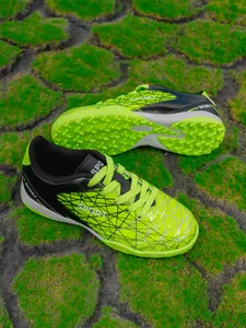Professional neon green kids turf football shoes with durable synthetic upper for training
