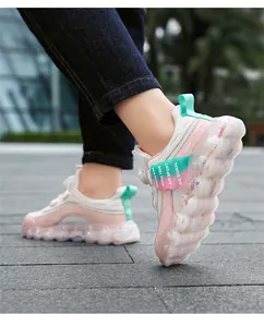 Kids' breathable mesh sneakers with rotating buckle closure for girls in pink and white