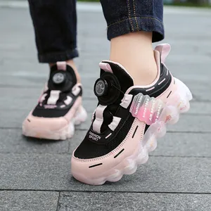Breathable girls sneakers with innovative rotary buckle system in pink and black.