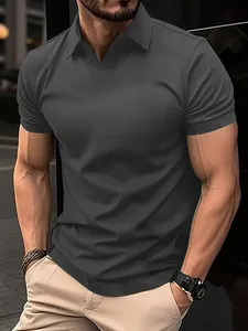 Detail of men's dark grey textured polo shirt featuring a V-neck and slim fit athletic design