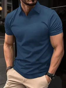 Close-up of men's navy blue polo shirt with premium elastic textured fabric.