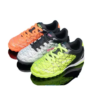 Durable turf soccer shoes for boys, professional training athletic footwear for children.