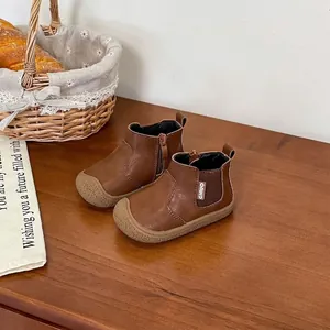 Classic brown children's leather Martin boots featuring soft anti-slip rubber soles