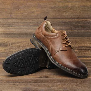 Detailed view of brown leather business shoes with non-slip sole and lace-up design